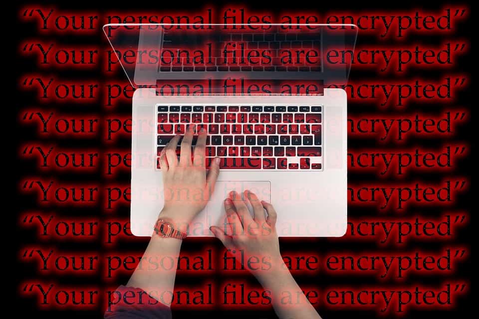 ransomware warning graphic that says your personal files are encrypted